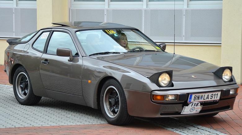 Dark gray 1983 Porsche 944 at a rally in Austria