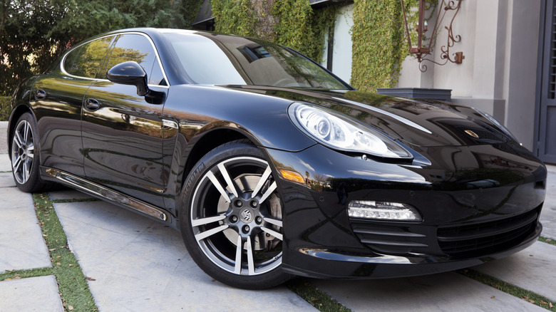 Black Porsche Panamera parked outside
