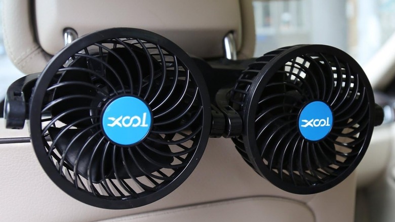 Close up of the XOOl backseat fans attached to headrest.