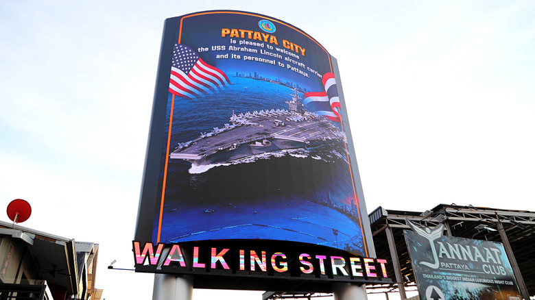 A digital billboard on Walking Street in Pattaya, Thailand welcoming the crew of the USS Lincoln