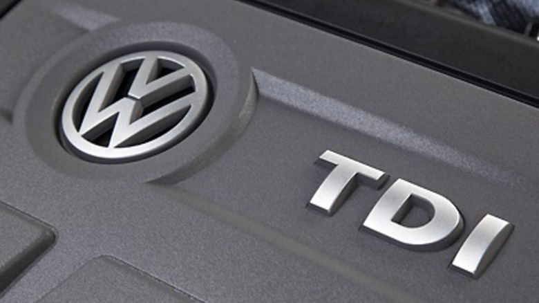 Engine cover showing VW badge and TDI branding