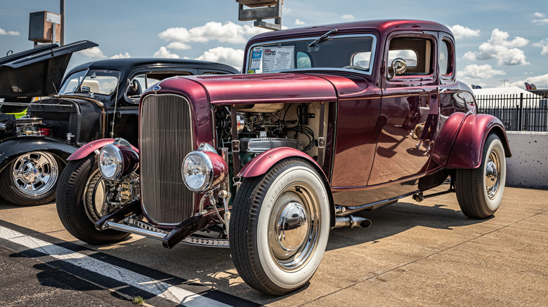 Low-down shot of a purple 1932 Ford hot rod