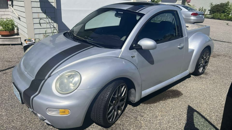 A silver Volkswagen Beetle ute