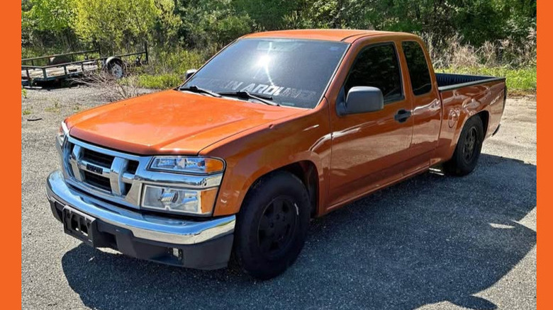 An orange Isuzu i-280 pickup