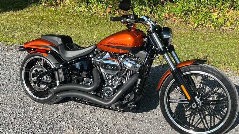 An orange and black Harley-Davidson