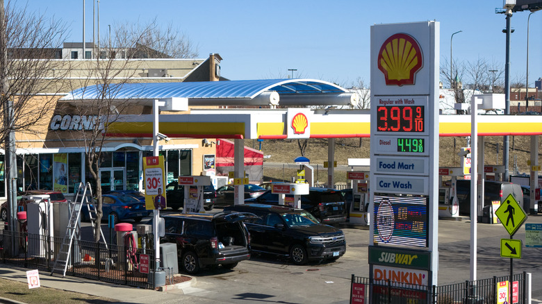 An aerial view shows a sign displaying prices for gasoline at a station on March 02, 2026 in Chicago, Illinois.
