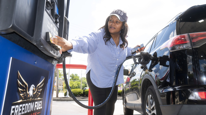 A customer pumps gas at a Freedom Fuel Network gas station on July 8, 2026 in Dresher, Pennsylvania