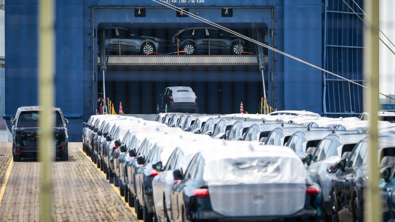 Cars are loaded onto the car carrier ship Polaris Liberty at the automotive terminal on August 11, 2025 in Bremerhaven, Germany.