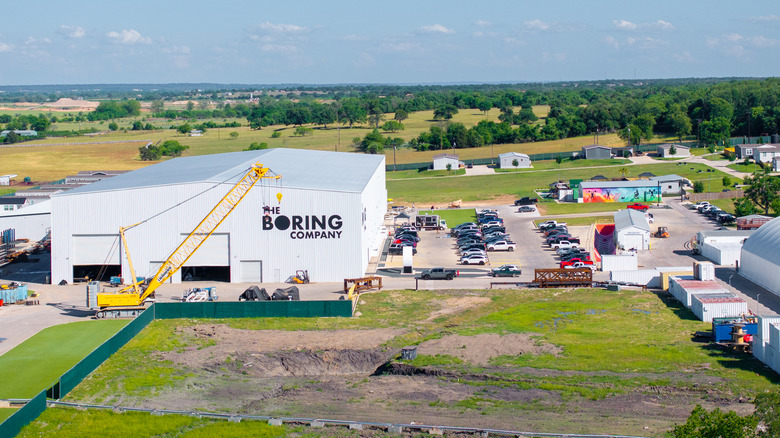 In an aerial view, the Boring Company facility is seen near the premises of Tesla CEO Elon Musk's Snailbrook town on April 21, 2025 in Bastrop, Texas.