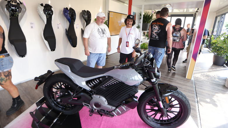 MILWAUKEE, WISCONSIN - JULY 14: Festival goers check out Harley-Davidson and Livewire JUMPSTART during the Harley-Davidson's Homecoming Festival - Day 1 at Veterans Park on July 14, 2023 in Milwaukee, Wisconsin. (Photo by Barry Brecheisen/Getty Images for Harley-Davidson)