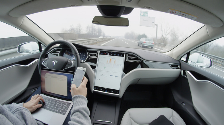 An old Tesla using driver-assist technology in Slovenia