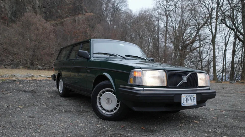 A green Volvo 240 wagon
