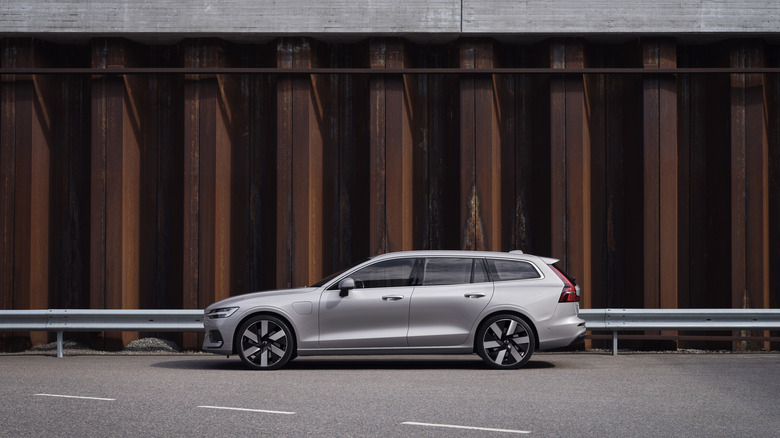 A silver Volvo V60 station wagon from the side