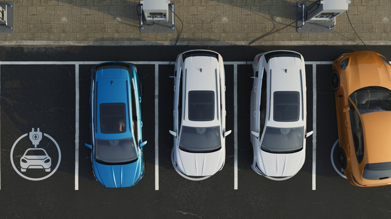 Top view of several EV parking spaces with fast chargers