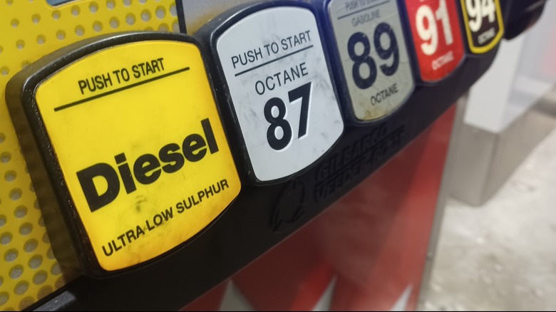 Fuel pump buttons with yellow diesel button visible.