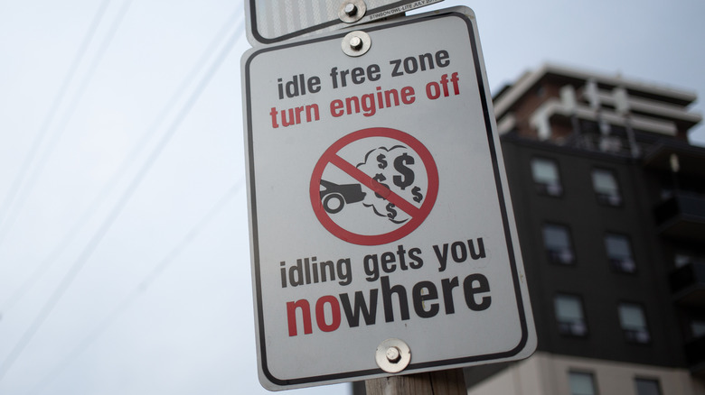 A sign that says "idle free zone turn engine off"