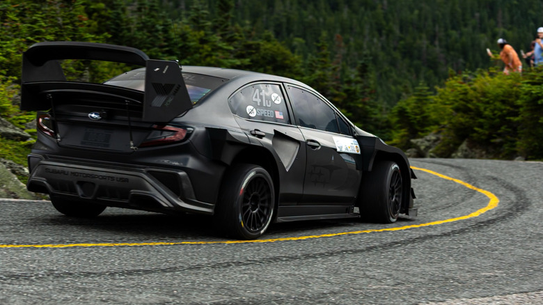 Rear 3/4 view of the Subaru WRX Project Midnight on the Mount Washington Auto Road
