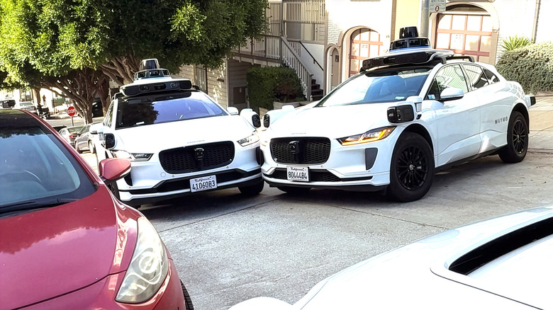 A screenshot of the three-way Waymo standoff in San Francisco
