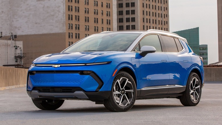 Blue Chevrolet Equinox EV parked on a rooftop in Detroit