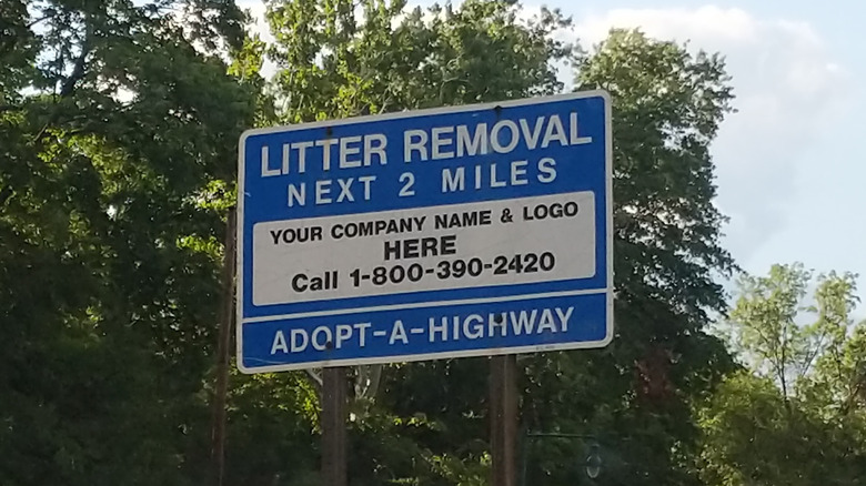An Adopt-A-Highway sign advertisement in New Jersey on display.