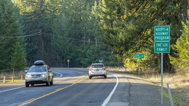 An adopt-a-highway sign on the Wilson River Highway in Oregon.