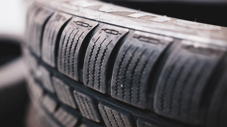 A closer look at the treads of a winter tire with zipper sipes for better grip