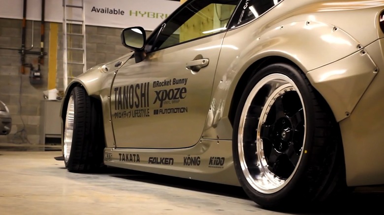 A modified Scion-FR with staggered wheels setup.