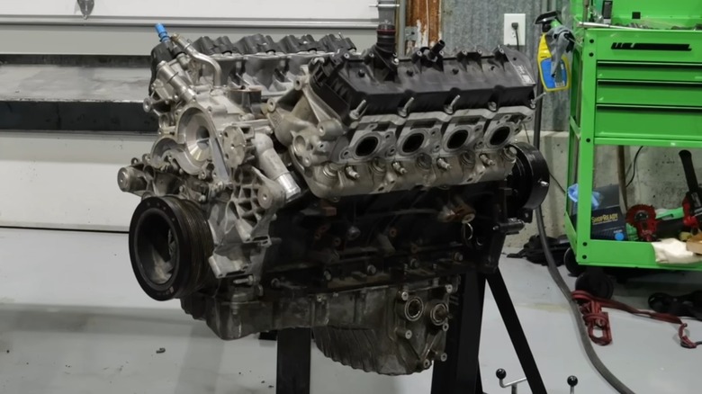 A shot of the Ford Godzilla V8 inside a garage