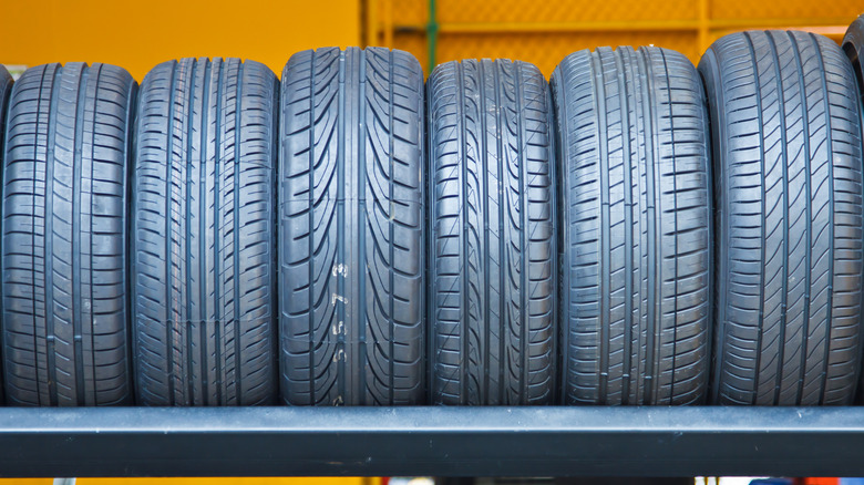 New tires on a rack at a tire store