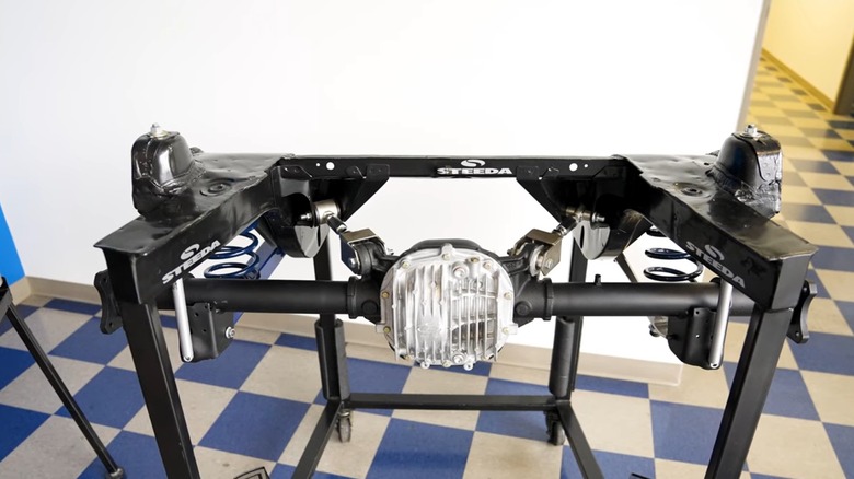 A solid rear axle from a Ford Mustang