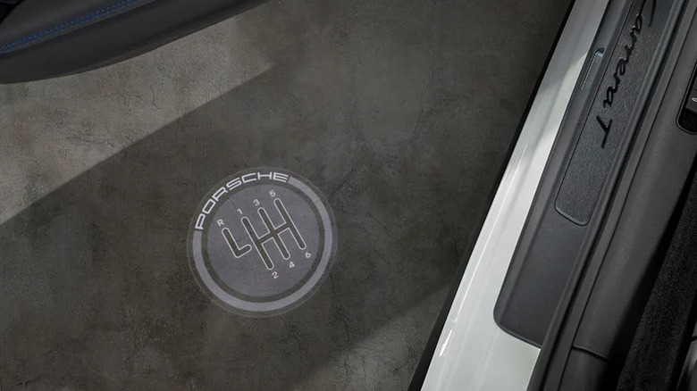 An artist's interpretation of the puddle light on the Porsche 911 Carrera T