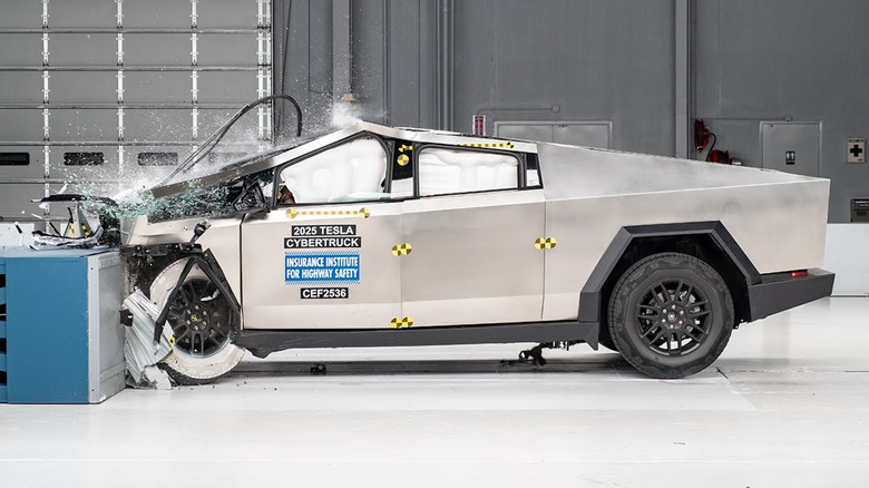 screenshot from the IIHS moderate front overlap crash test of a Cybertruck as it hits the barrier
