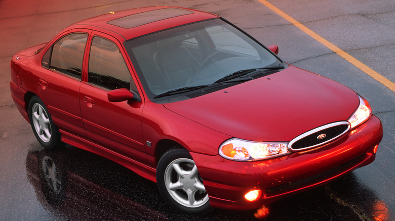 A red, 1998 Ford SVT Contour sedan.