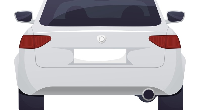 A white badgeless sedan car from the rear on a white background.
