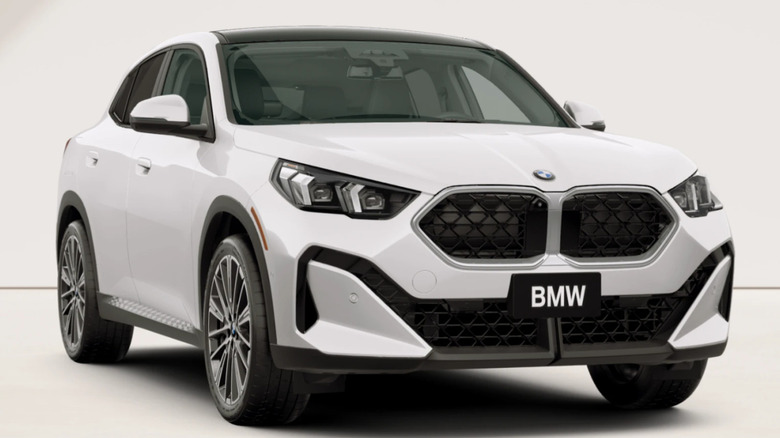 front three-quarters shot of a white BMW X2  with the Sport package showing the strange and cheaper appearance
