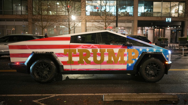 Donald Trump-adorned Tesla Cybertruck sits in traffic on January 19, 2025 in Washington, DC.