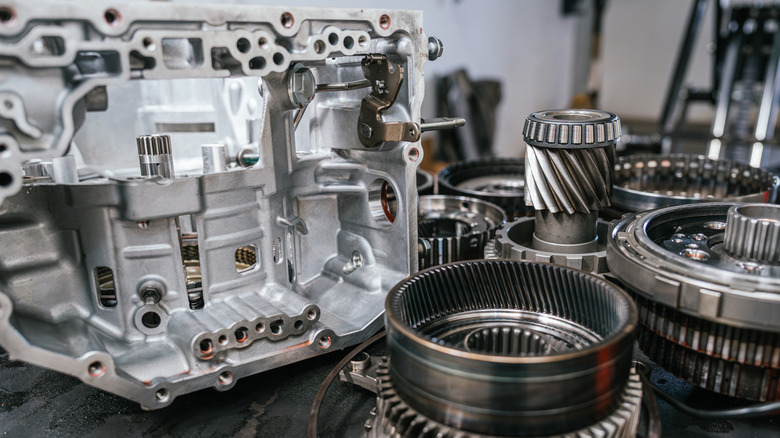 Clean automotive gears and mechanical components dissasembled.