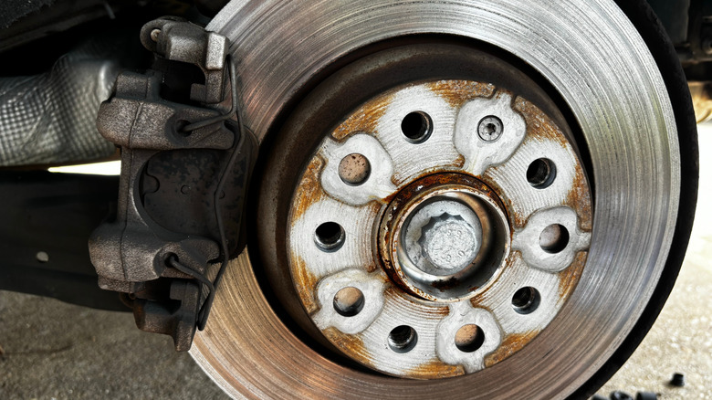 Closeup of a worn out brake rotor.