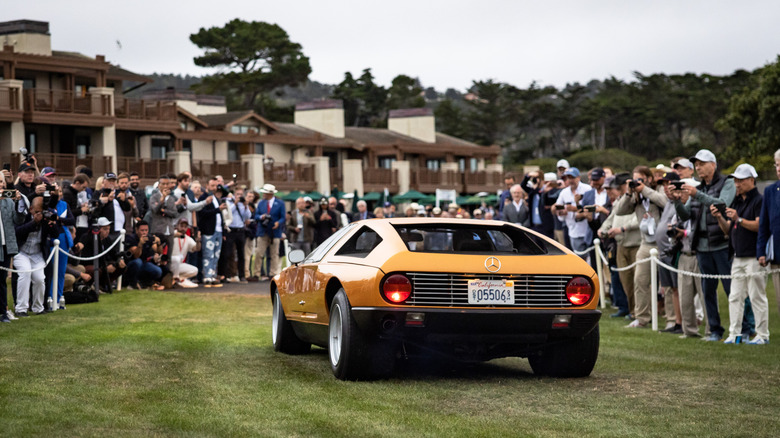 A 1970 Mercedes-Benz C111 is seen arriving during Dawn Patrol at Pebble Beach Concours d'Elegance on August 18, 2024 in Monterey, California.