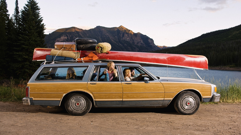 Family road trip in an old wagon