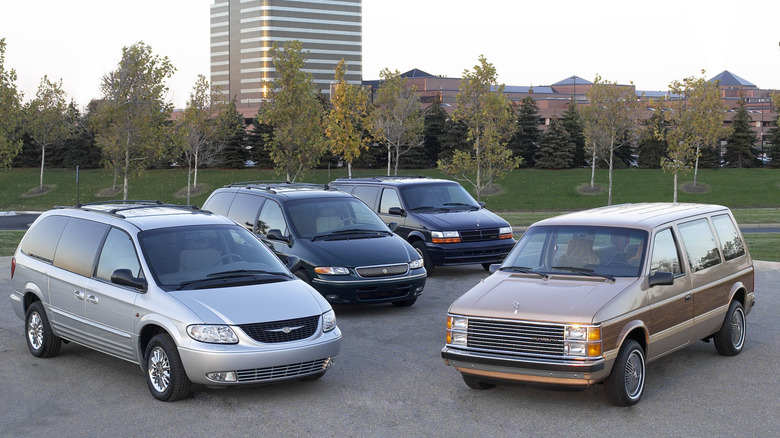 Four generations of the minivan on its 20th anniversary. From left, the 1984 Plymouth Voyager, 1994 Dodge Caravan, 1996 Chrysler Town & Country and a 2002 Chrysler Grand Voyager (outside North America).