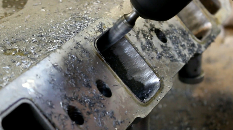 Small grinding tool porting an intake manifold