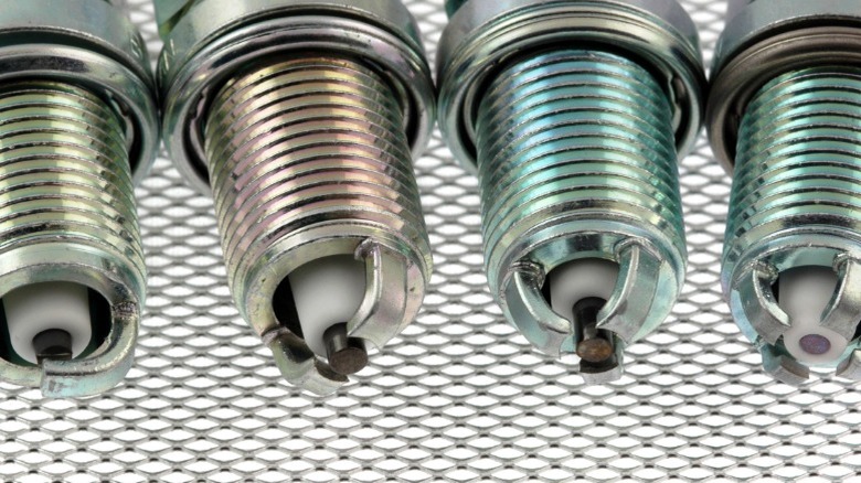 a collection of various different types of spark plugs