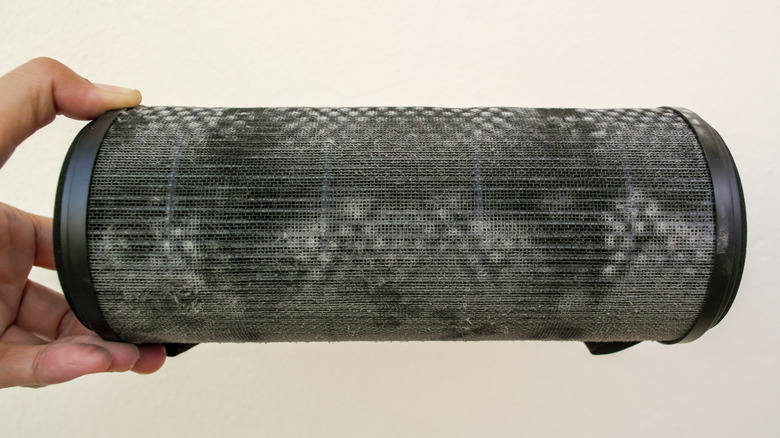 A dirty filter from a car air purifier