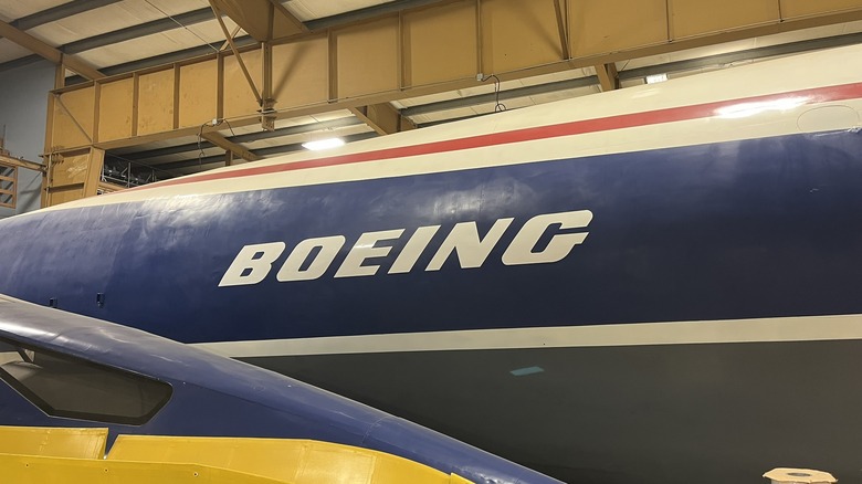 Side profile of the Boeing SST mockup, featuring the Boeing logo, and the dissasmbled droop-snoot