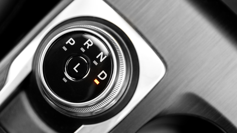 a closeup shot of a car's automatic gear shifter