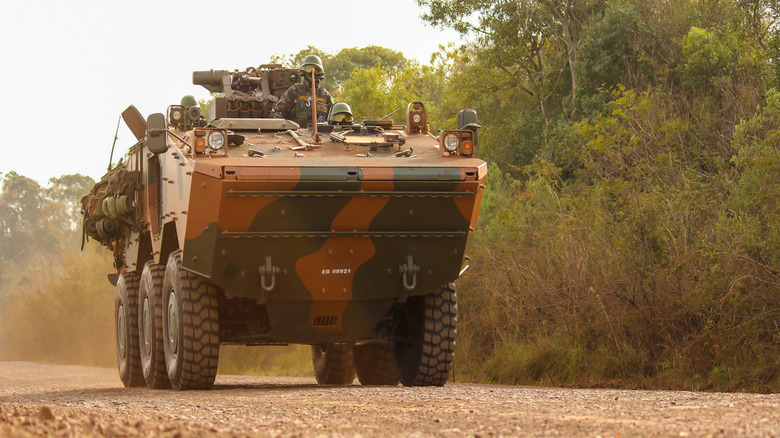 A Guarani 6x6 on an unpaved road