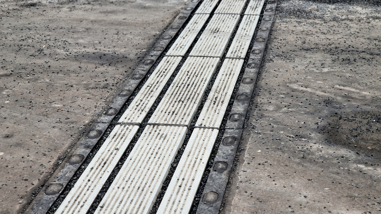 A bridge expansion joint that enables the two concrete slabs to deal with thermal expansion.