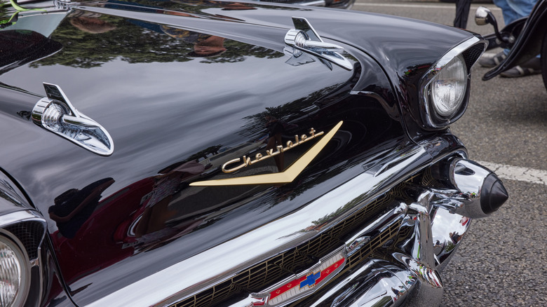 A black 1957 Chevy Bel Air's front end
