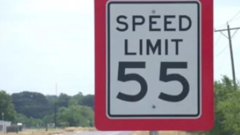Texas red border speed limit sign